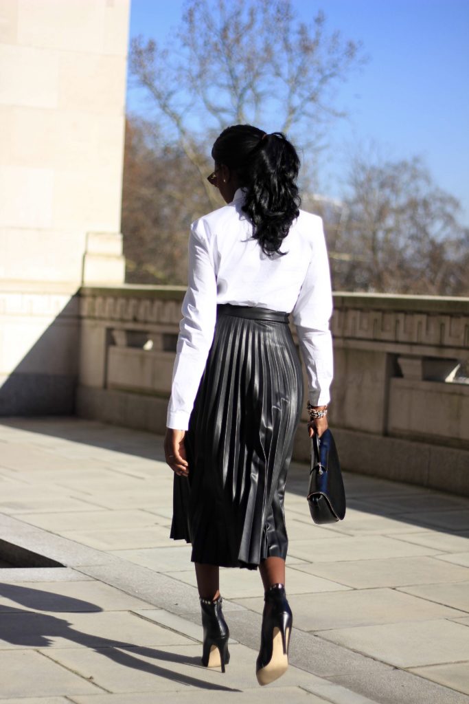 black pleated leather skirt outfit